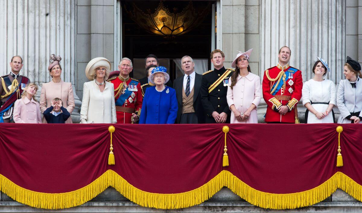 Several members of the royal family including Princess Beatrice and Princess Eugenie, who an expert has called 'hangers-on,' standing on the balcony of Buckingham Palace during the Trooping the Colour ceremony