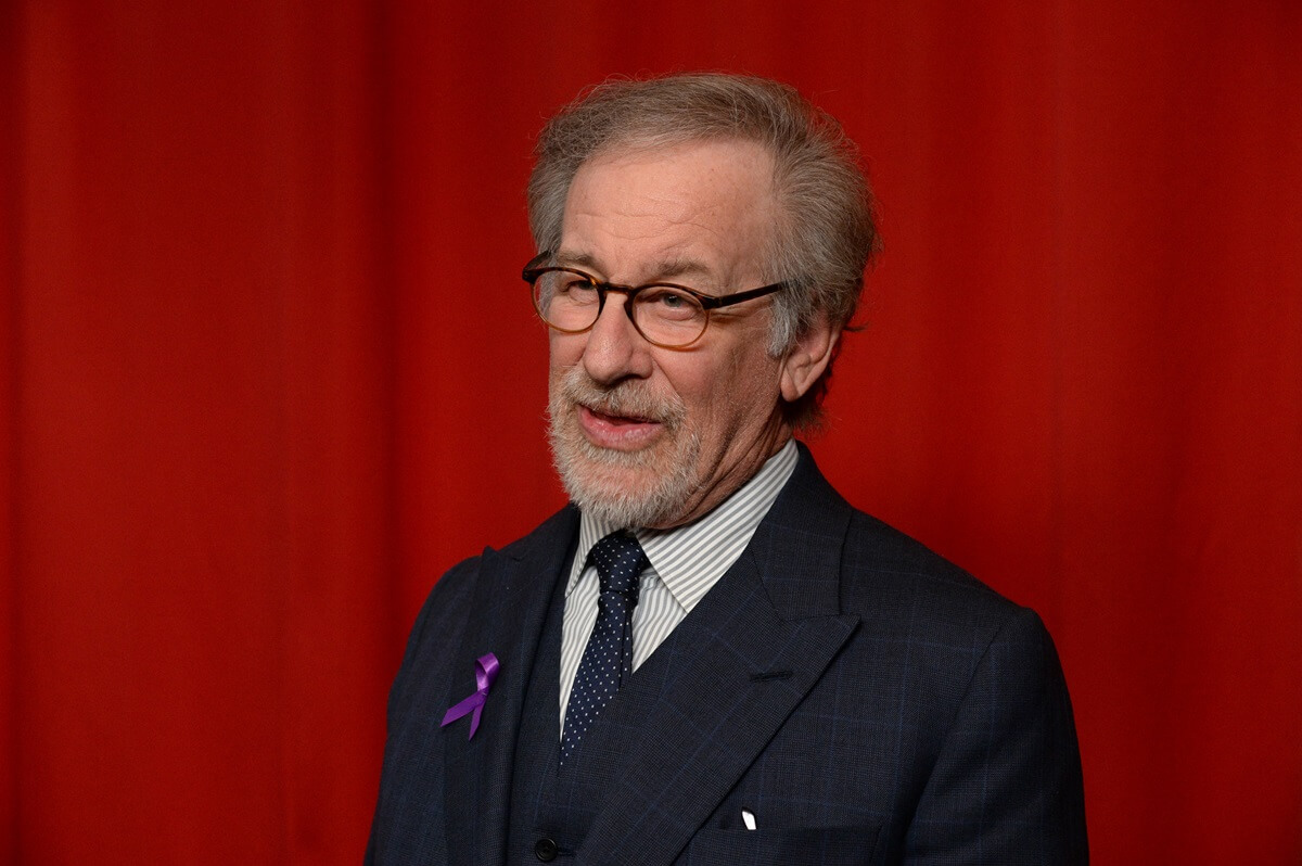 Steven Spielberg speaking while wearing a suit at the the 18th Annual AFI Awards.