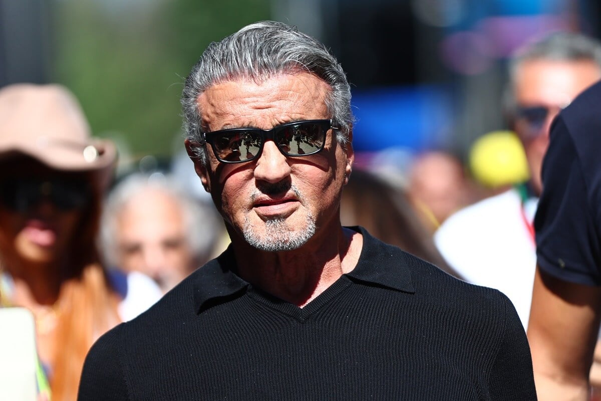 Sylvester Stallone walking while wearing sunglasses at the Paddock prior to the F1 Grand Prix of Italy at Autodromo Nazionale Monza.