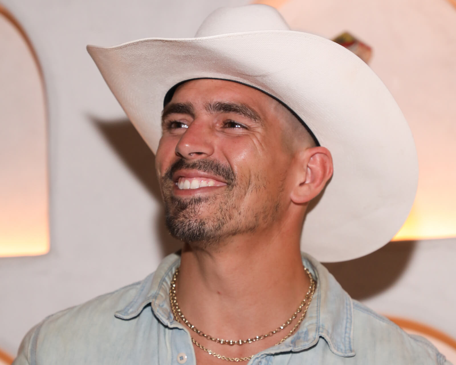 'The Challenge' Season 39 mercenary Jordan Wiseley wearing a cowboy hat and smiling