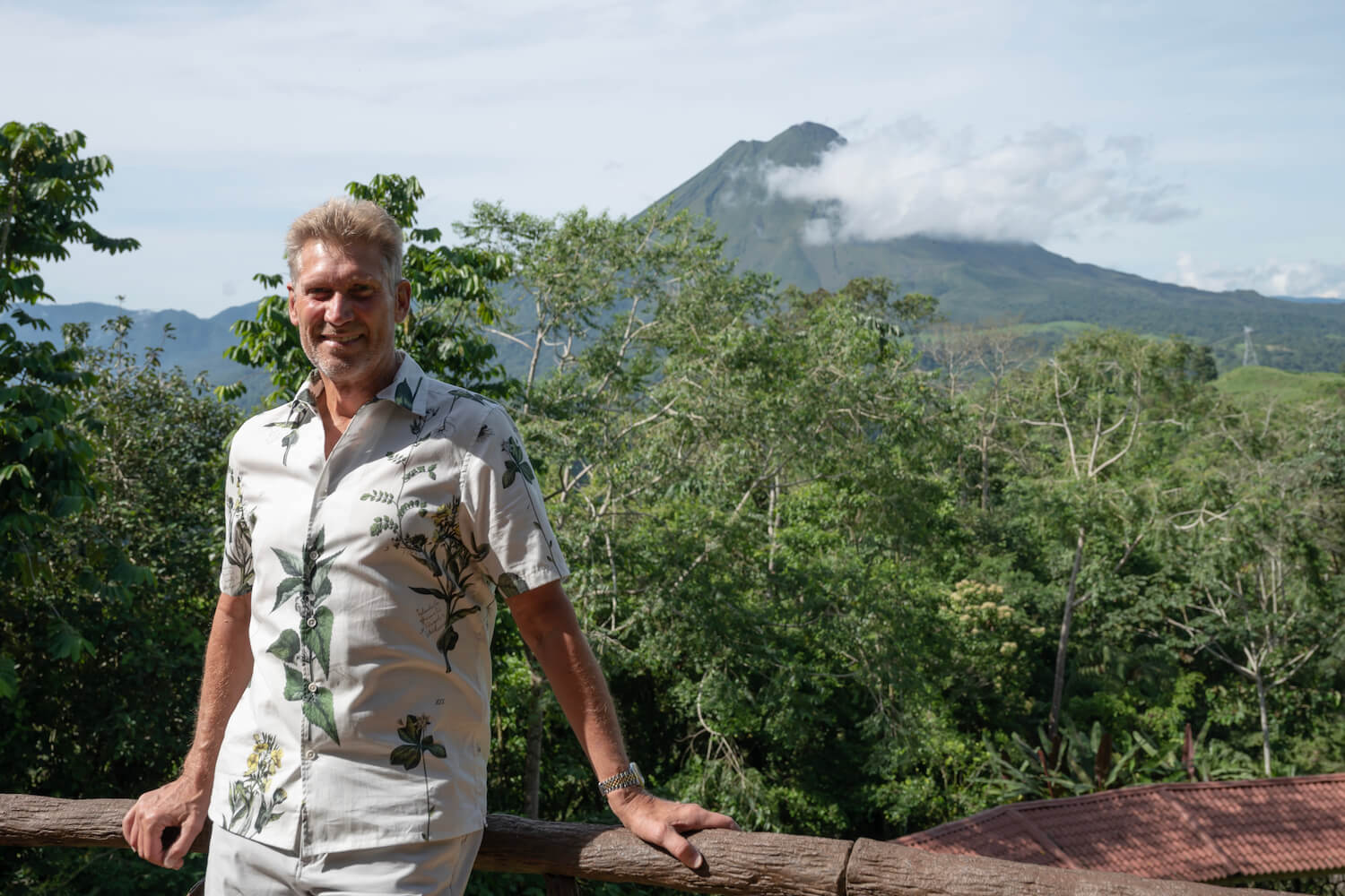 'The Golden Bachelor' star Gerry Turner smiling in Costa Rica with mountains in the background