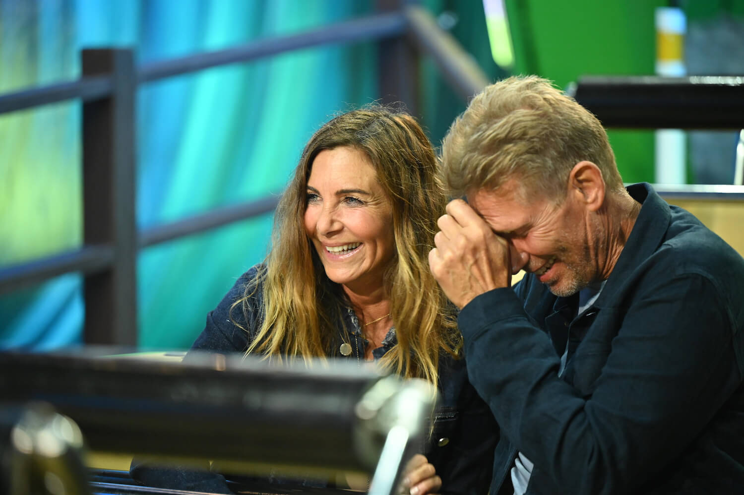 'The Golden Bachelor' contestant Leslie Fhima in a roller coaster laughing with Gerry Turner