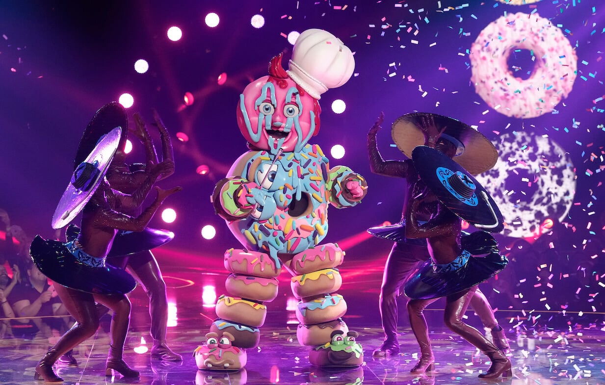 Donut in 'The Masked Singer' Season 10 singing on stage with backup dancers