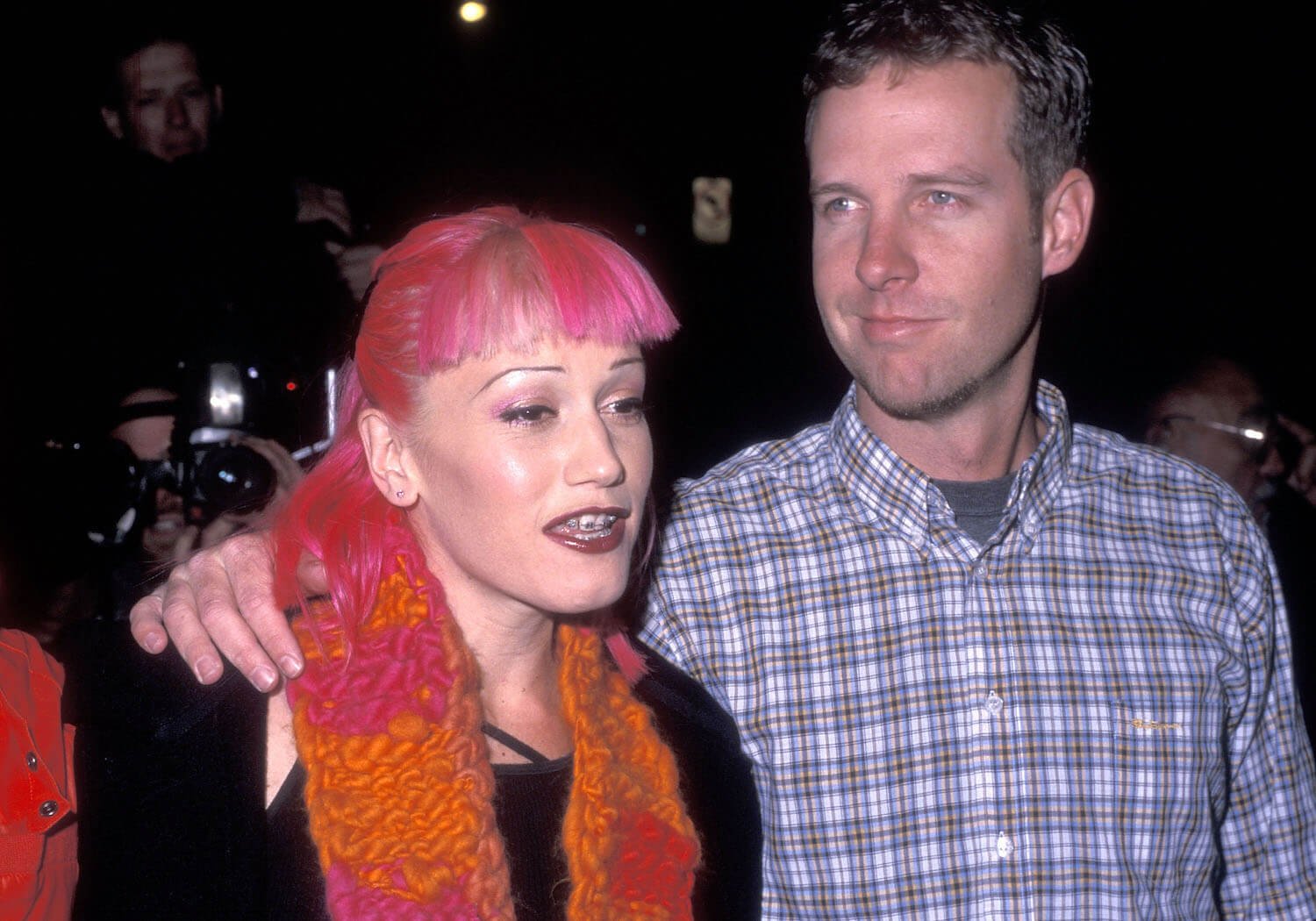 'The Voice' Season 24 coach Gwen Stefani in 1999 with pink hair and braces with musician Tom Dumont of No Doubt