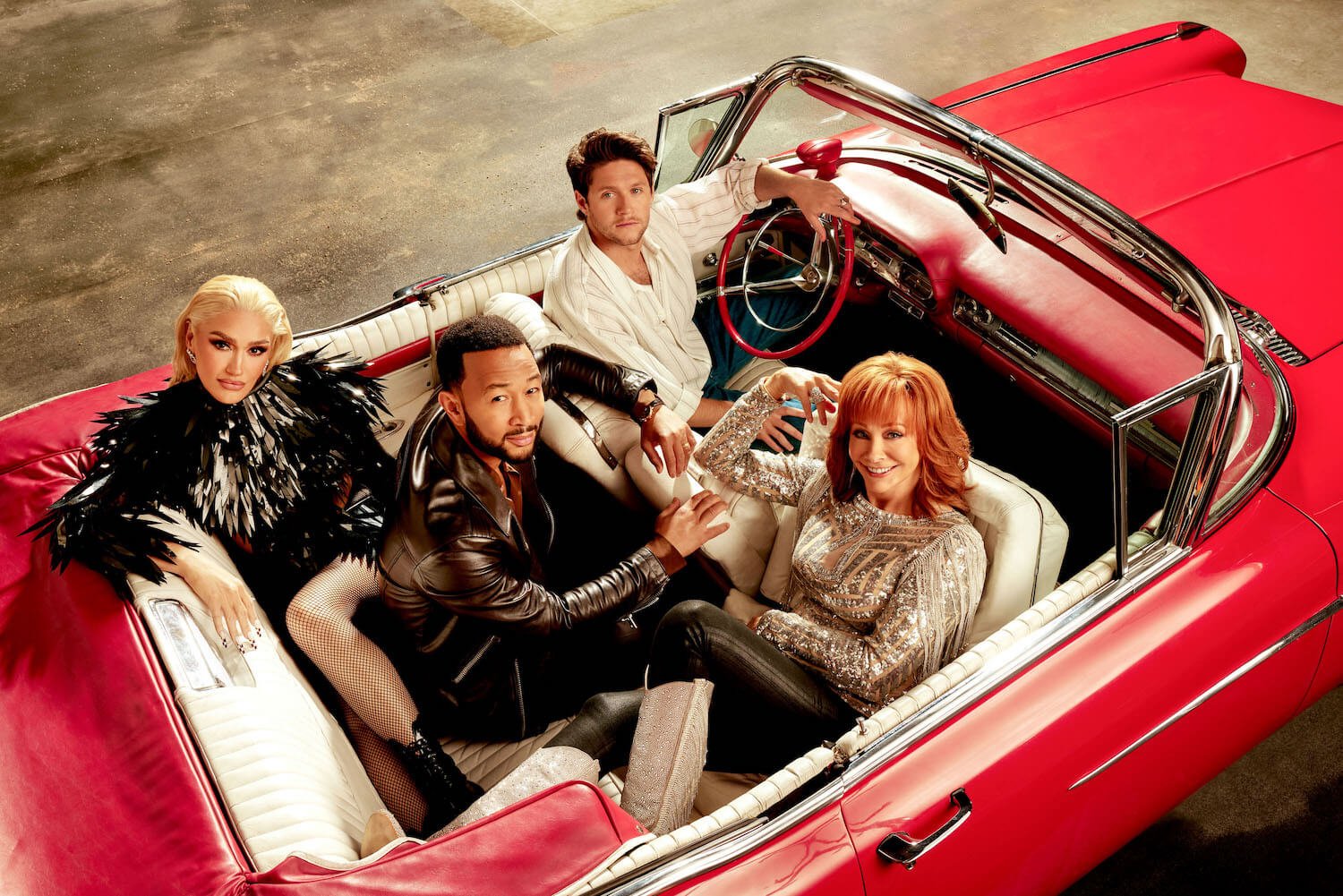 'The Voice' Season 24 coaches Gwen Stefani, Niall Horan, John Legend, and Reba McEntire in a red convertible