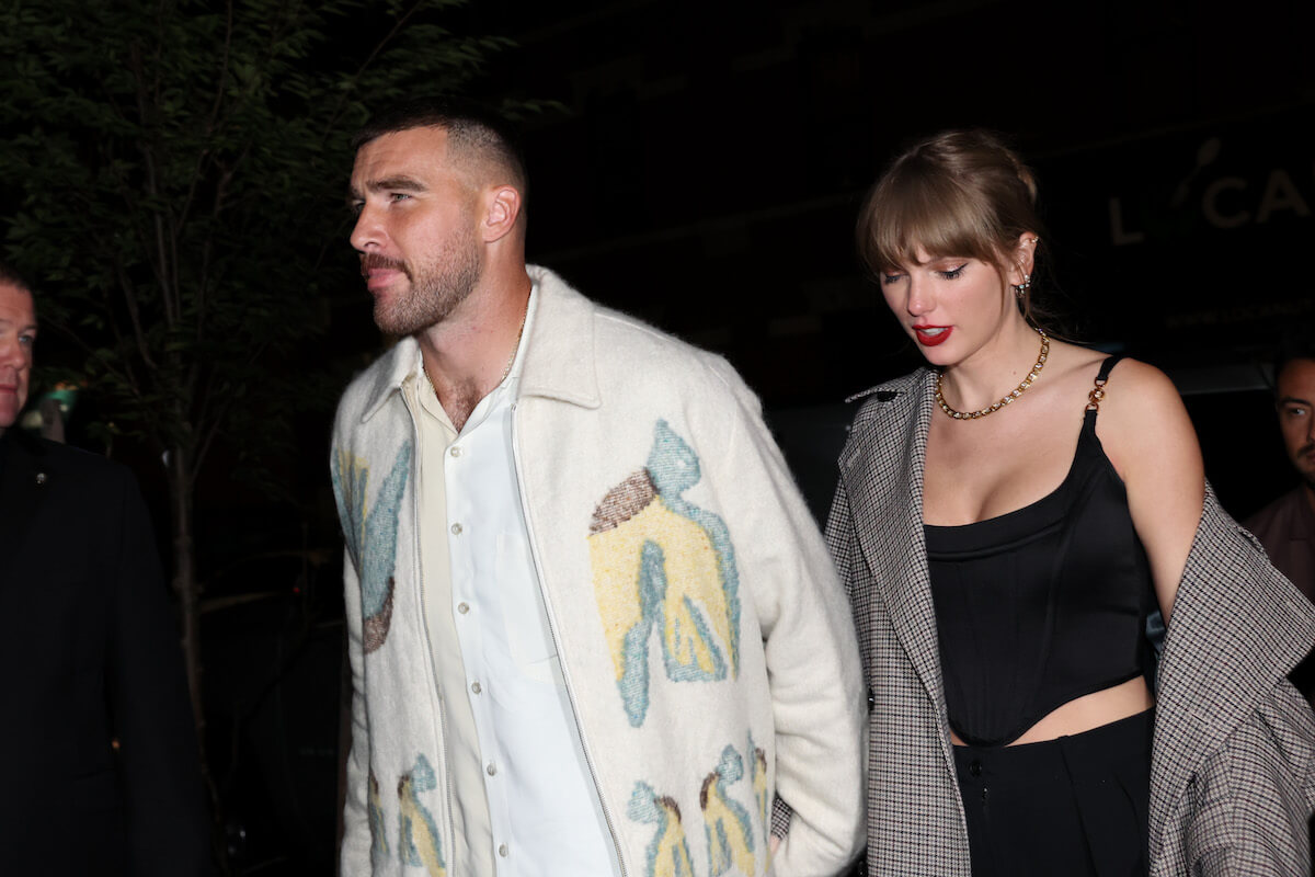 Travis Kelce and Taylor Swift, who Hilarie Burton predicts will be engaged by May 2024, in New York