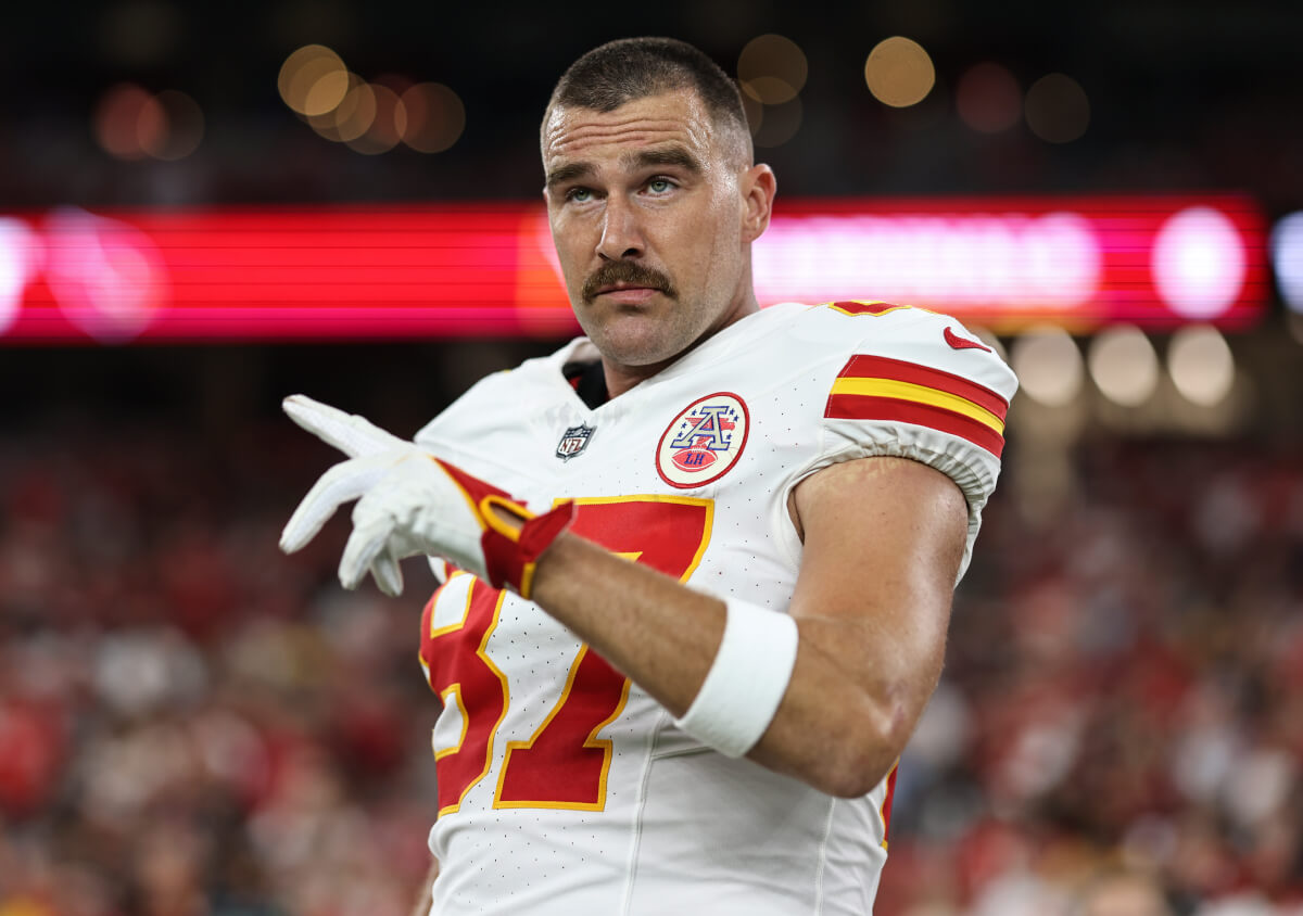 Travis Kelce #87 of the Kansas City Chiefs reacts prior to an NFL preseason football game between the Arizona Cardinals and the Kansas City Chiefs at State Farm Stadium on August 19, 2023 in Glendale, Arizona