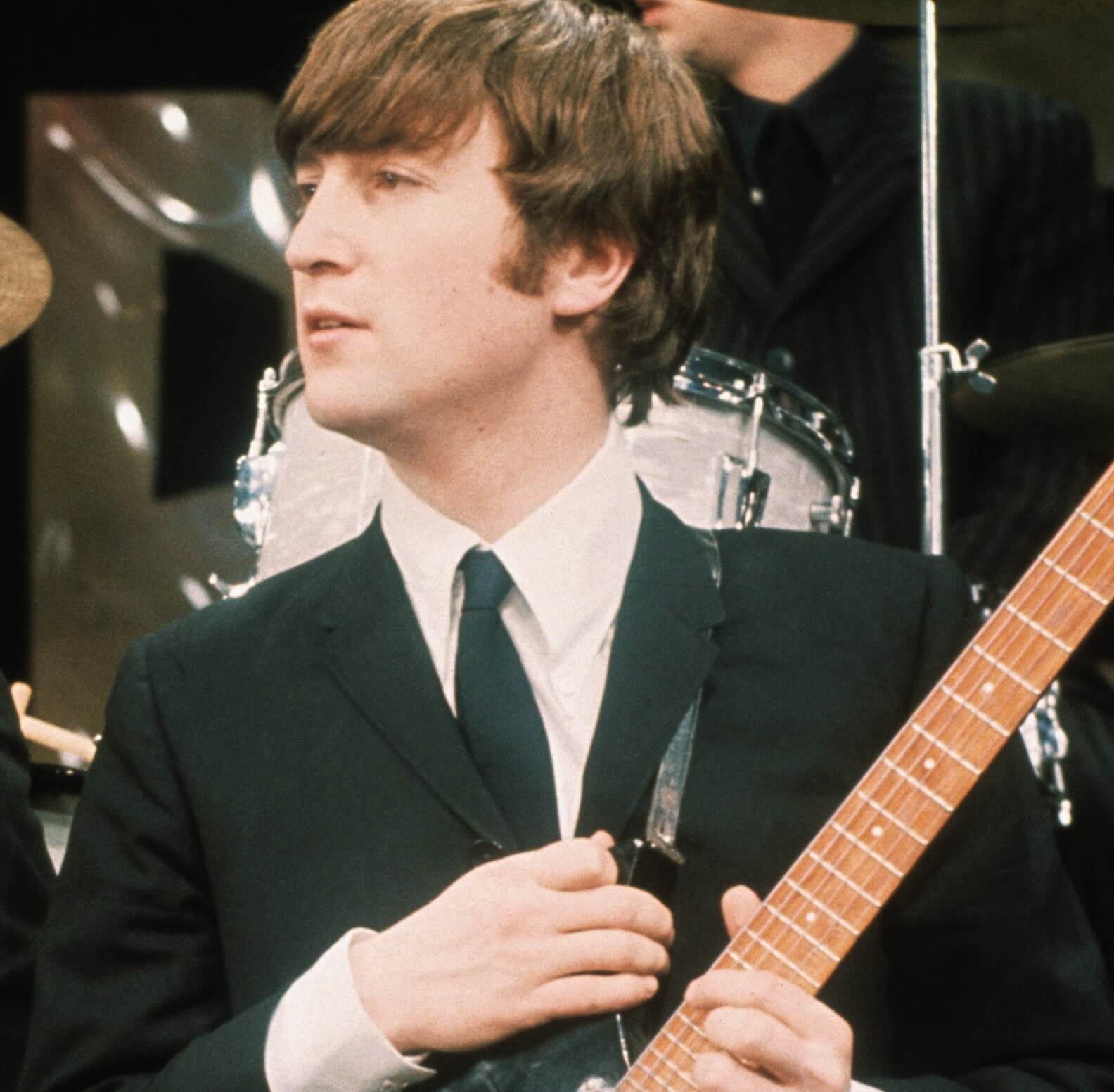 "Imagine" singer John Lennon holding a guitar