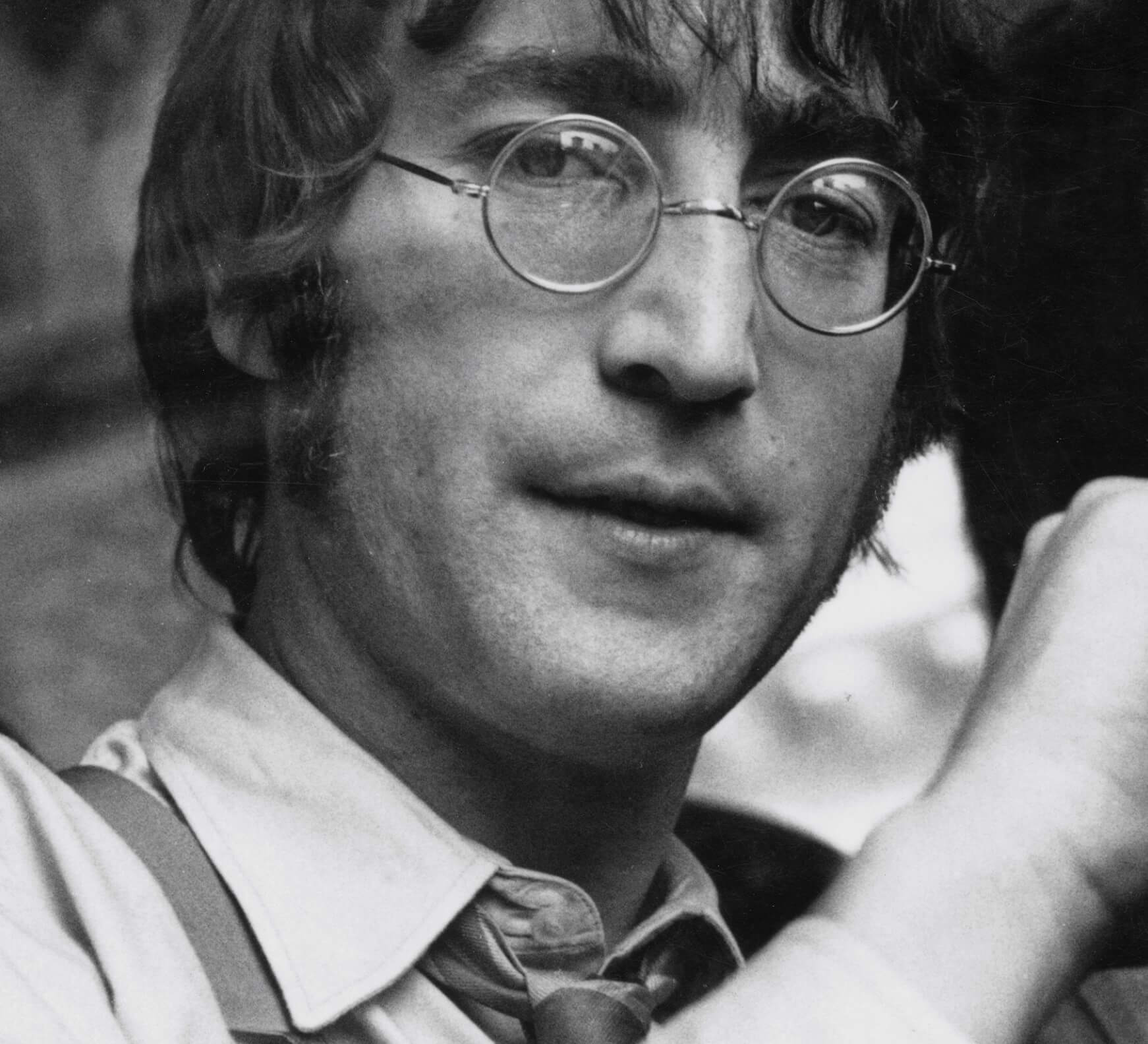 John Lennon wearing glasses