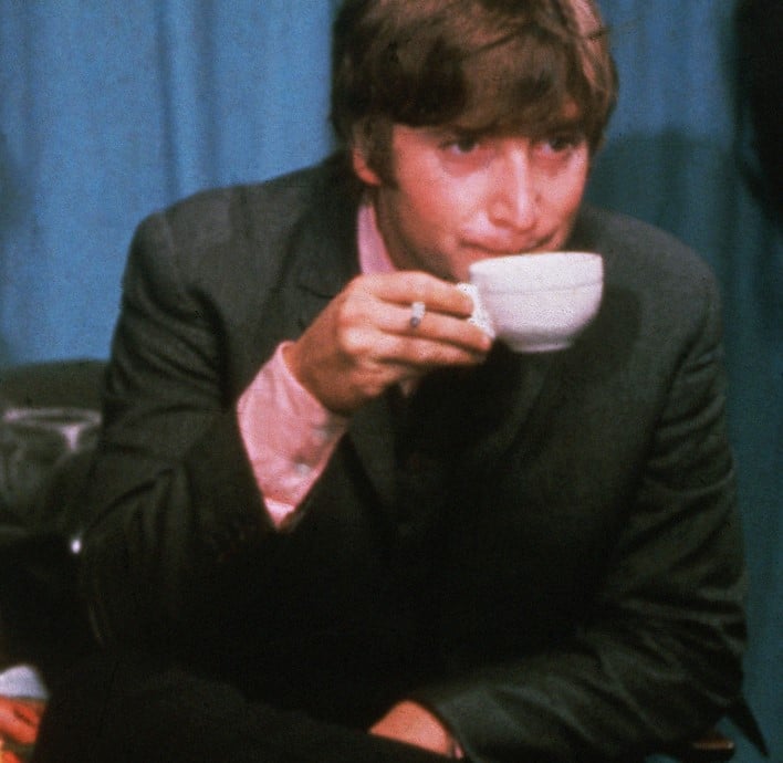"Whatever Gets You Thru the Night" singer John Lennon with a teacup