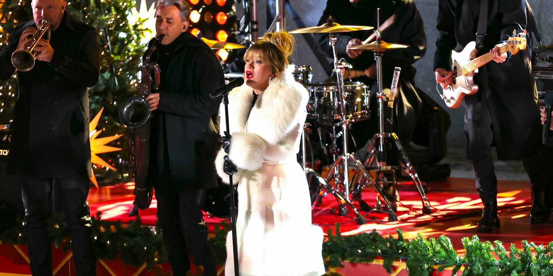 Kelly Clarkson hosts and performs at the 2023 Rockefeller Center Christmas Tree lighting ceremony.