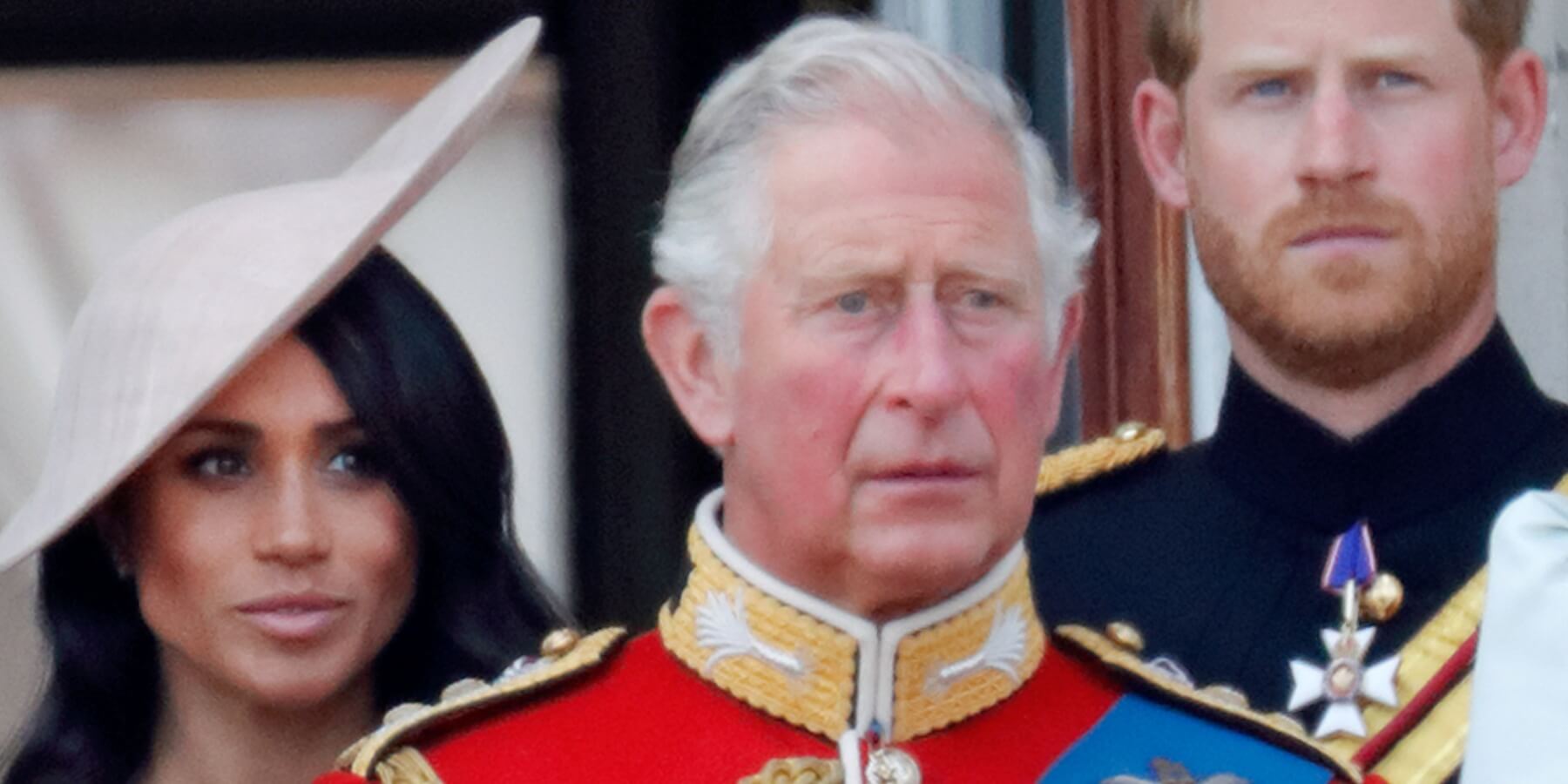 Meghan Markle, King Charles and Prince Harry photographed in 2018.