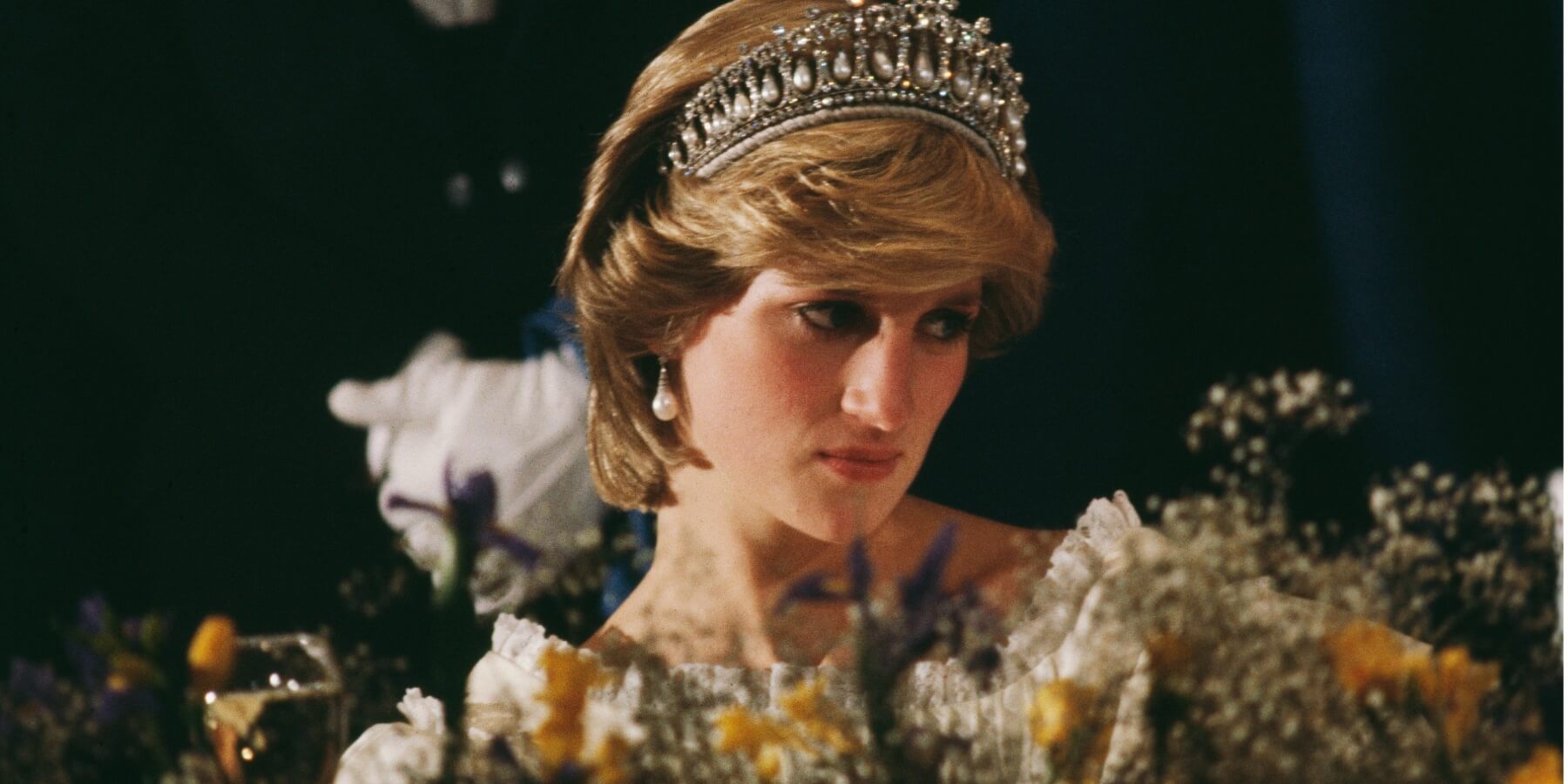 Princess Diana at a banquet in Nova Scotia during the royal tour of Canada, in June 1983. She is wearing the Queen Mary tiara.