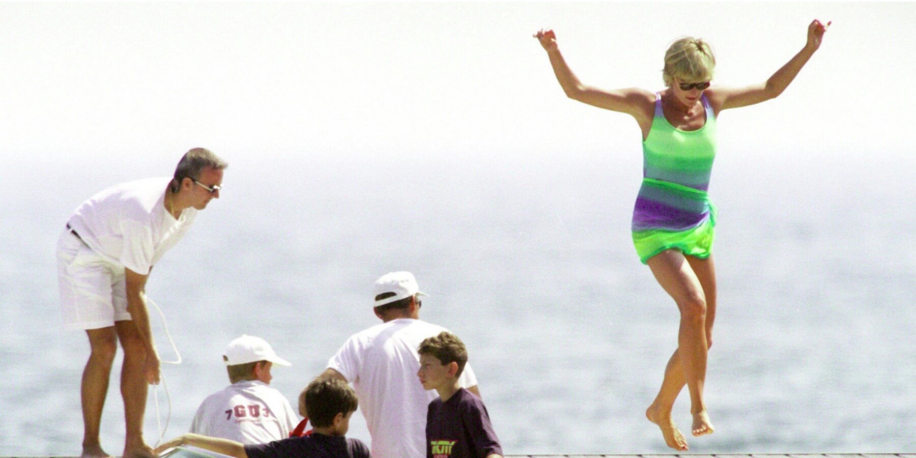 Princess Diana jumps off a yacht in St. Tropez in the summer of 1997.