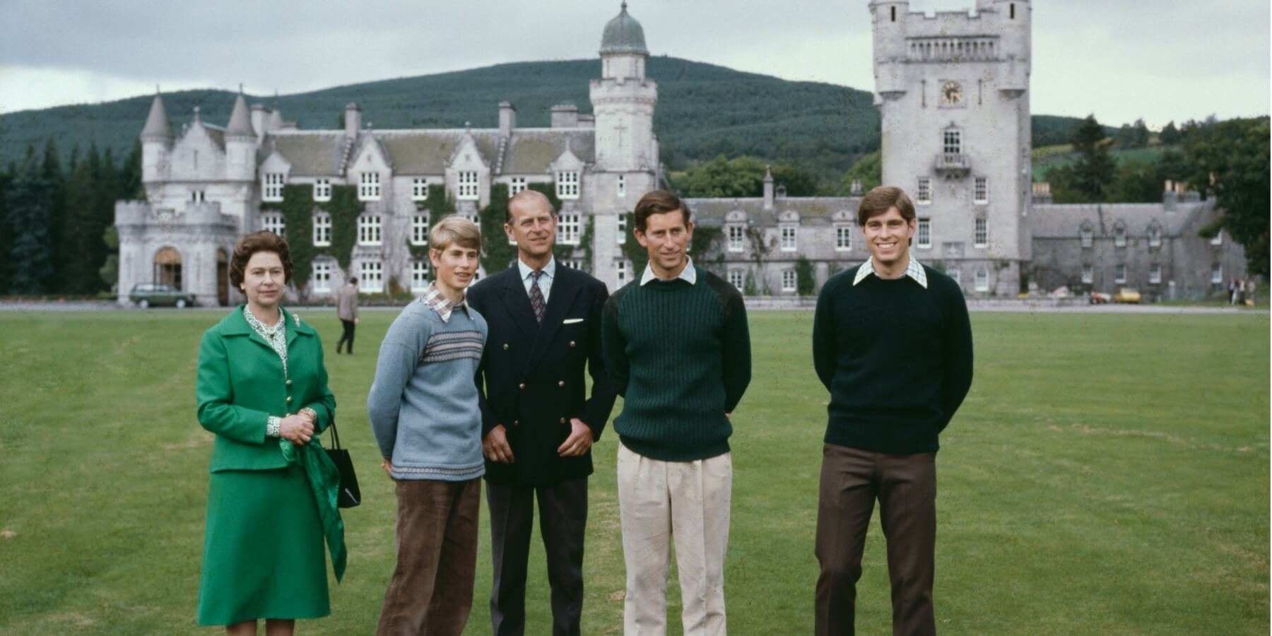 Queen Elizabeth, Prince Andrew, Prince Philip, Prince Charles, and Prince Andrew on the grounds of Balmoral Estate in Scotland.