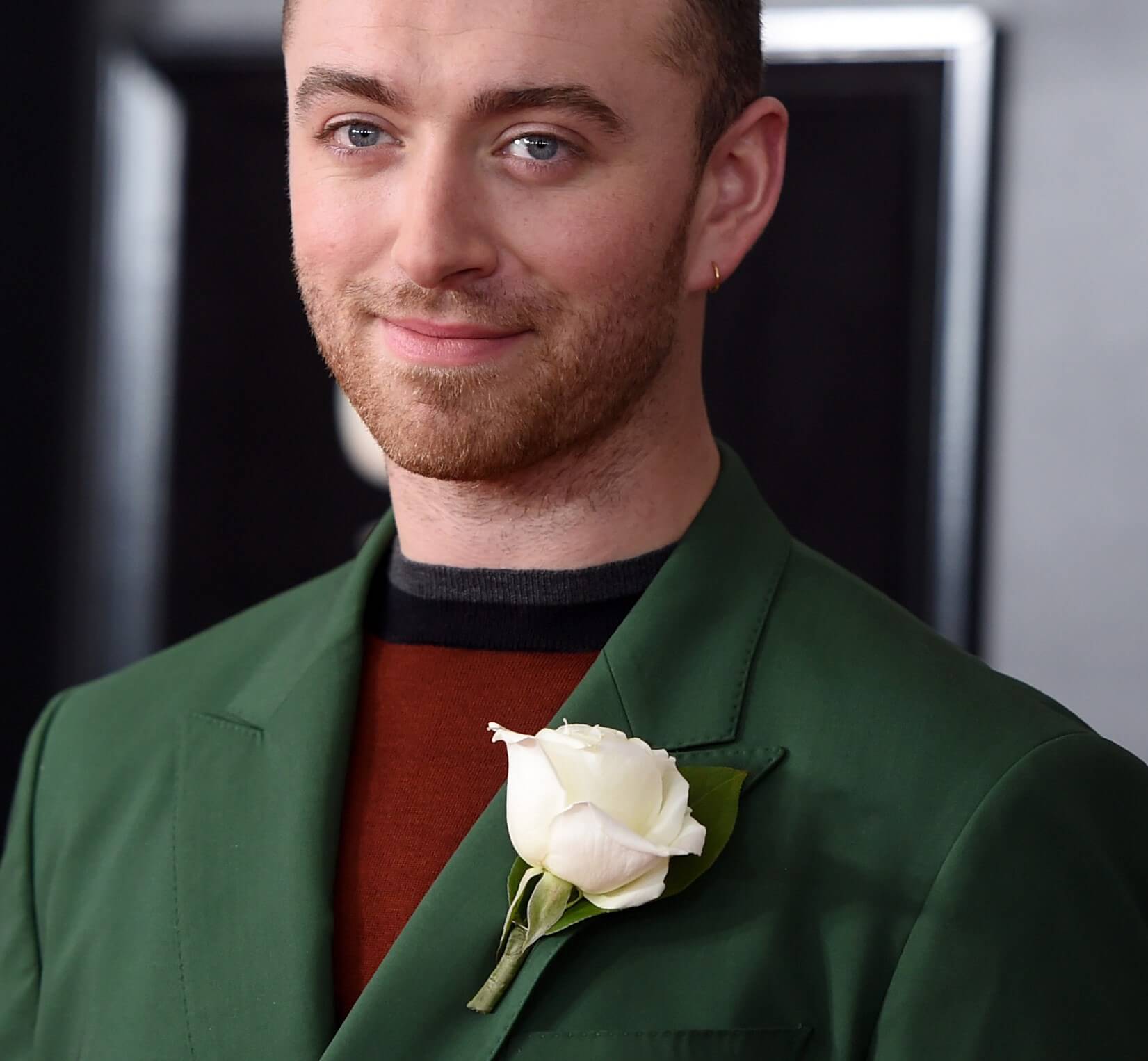 "Stay with Me" singer Sam Smith wearing green