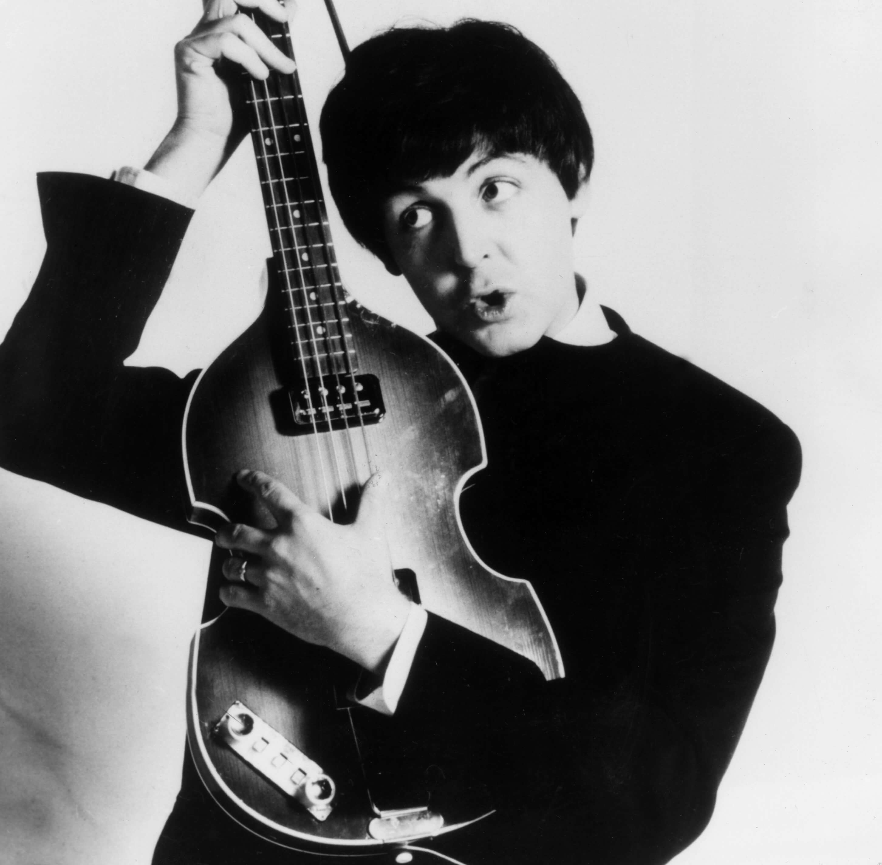 Paul McCartney with a guitar during The Beatles' "Here, There and Everywhere" era