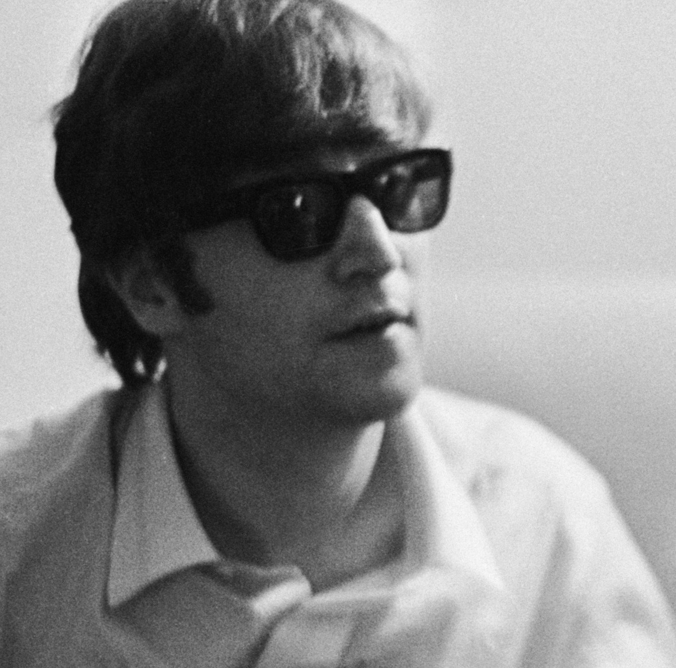 The Beatles' John Lennon wearing glasses