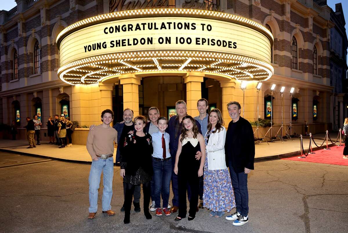 Montana Jordan, Steven Molaro, Annie Potts, Steve Holland, Iain Armitage, Lance Barber, Raegan Revford, Matt Hobby, Zoe Perry and Chuck Lorre pose at the premiere of Warner Bros. 100th Episode of "Young Sheldon" at Warner Bros. Studios on March 18, 2022. 'Young Sheldon' will enter its final season on Feb. 15.