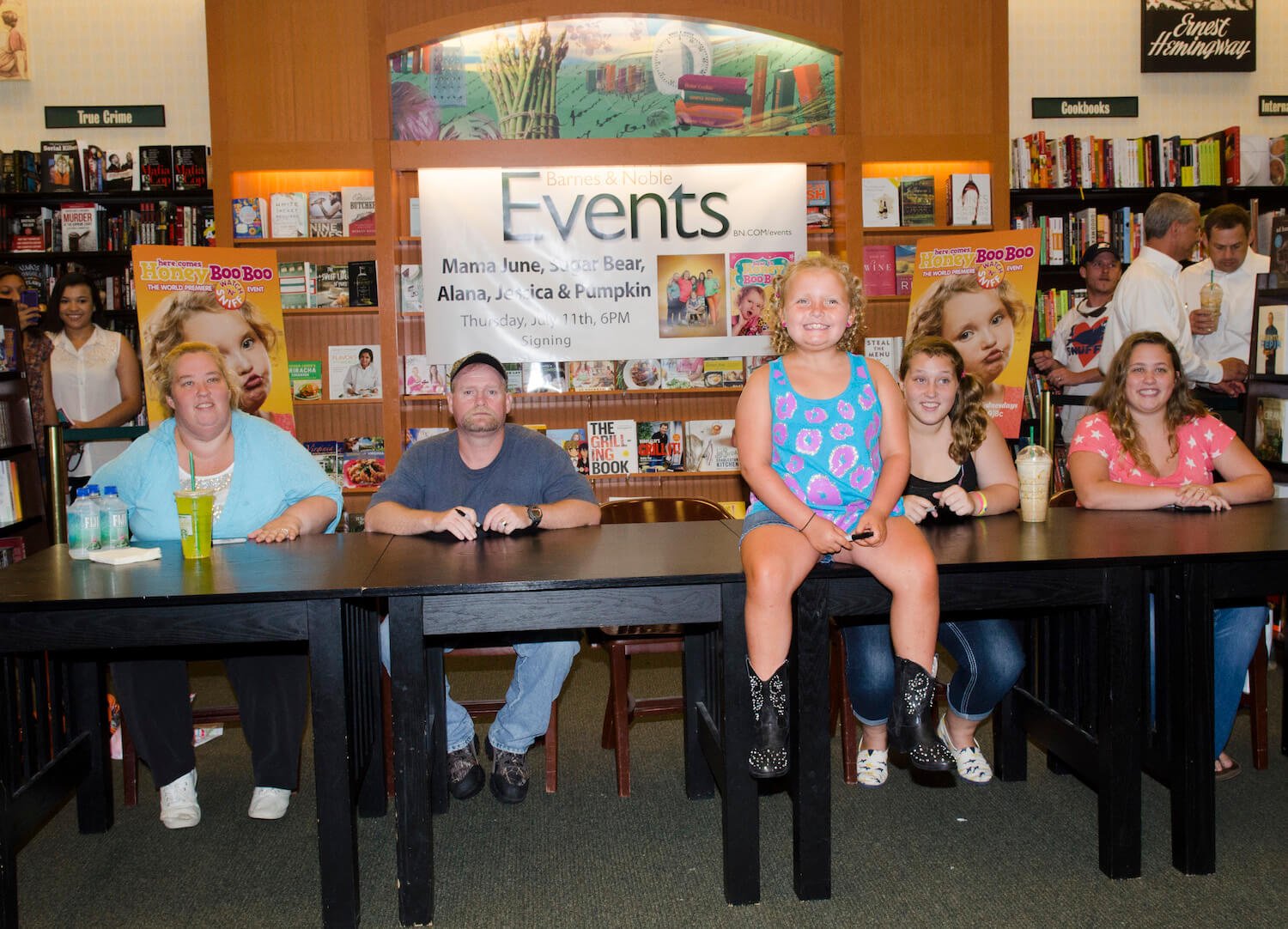 'Here Comes Honey Boo Boo' stars 'Mama' June Shannon, Mike 'Sugar Bear' Thompson, Alana 'Honey Boo Boo' Thompson, Anna 'Chickadee' Shannon. and Lauryn 'Pumpkin' Shannon sitting at an event