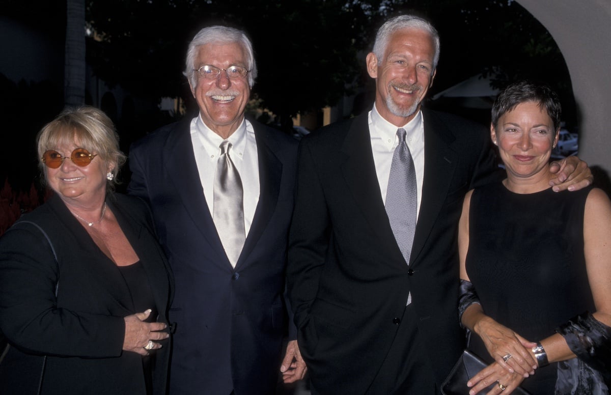 Dick Van Dyke with his son Christian Van Dyke posing with their wives