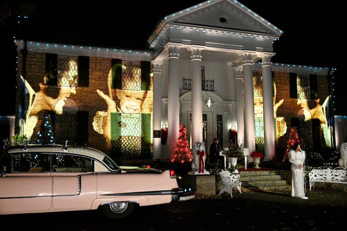 Images of Elvis and his family projected on the exterior of Graceland