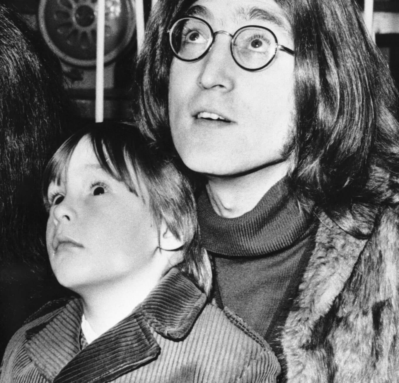 John Lennon and his son, Julian Lennon, in black-and-white
