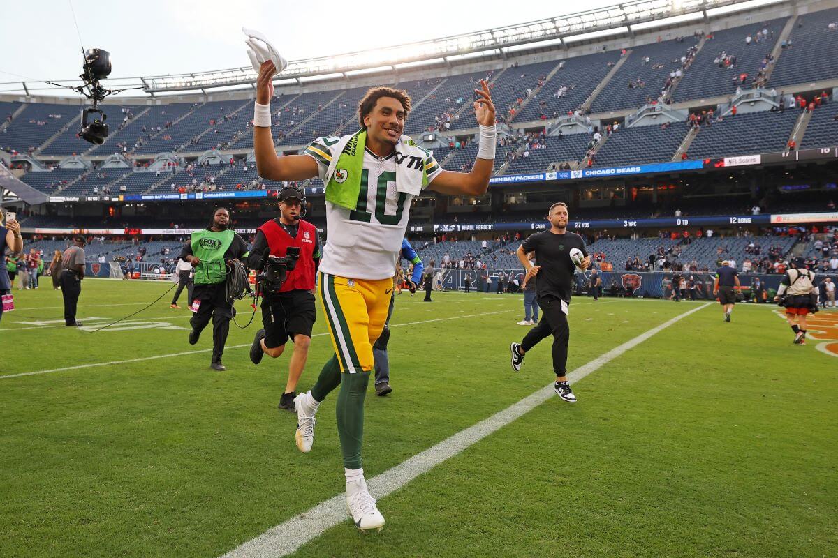 Jordan Love celebrates after a win against the Chicago Bears