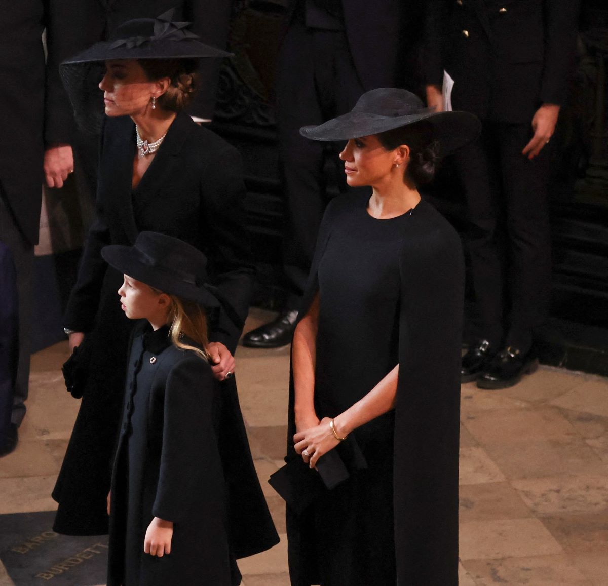 Kate Middleton along with her daughter Princess Charlotte, whose reaction when she saw Meghan Markle during Queen Elizabeth's funeral is going viral