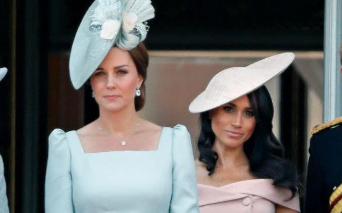 Kate Middleton, who an expert says will 'punish' Meghan Markle in her own way, stand on the balcony of Buckingham Palace together during Trooping The Colour 2018