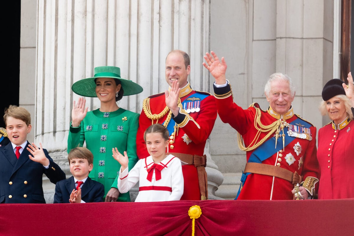 Kate Middleton, who is the 'power behind the throne,' stands with Wales family, King Charles, and Queen Camilla