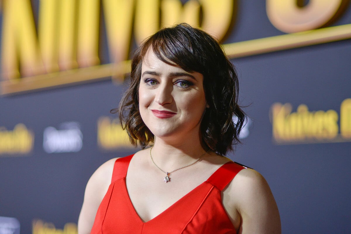 Mara Wilson, 'Miracle on 34th Street' star, at 'Knives Out' premiere wearing a red dress