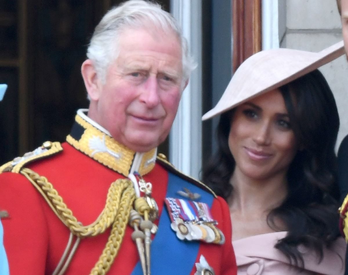 Meghan Markle, who some believe was mocking King Charles III during a recent outing, standing on the balcony of Buckingham Palace together during Trooping The Colour 2018