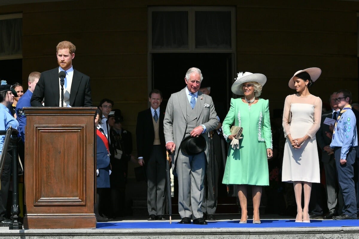 Prince Harry with King. Charles, Camilla Parker Bowles, and Meghan Markle