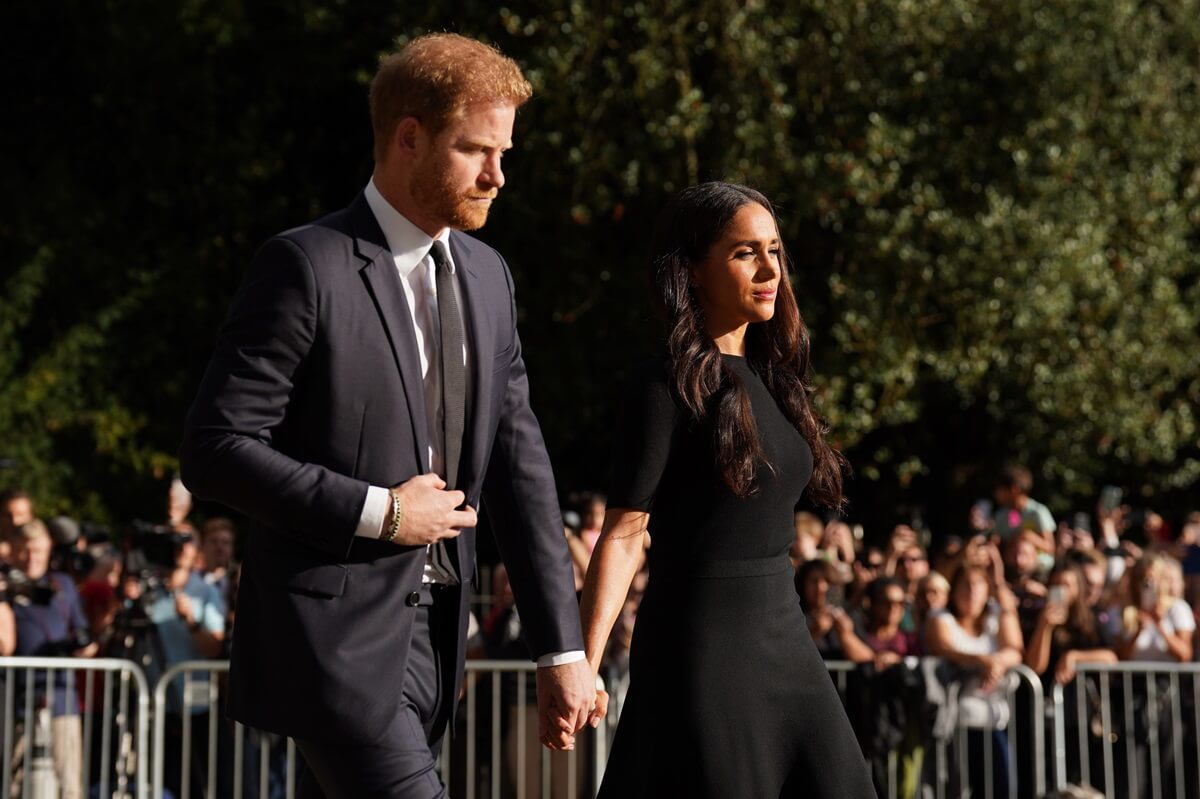 Prince Harry and Meghan Markle meet members of the public at Windsor Castle
