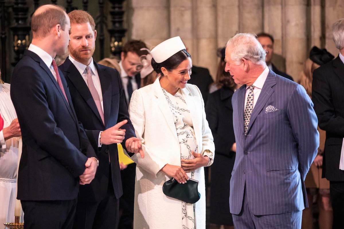 Prince Harry, who held back a retort about the royal family when he introduced Meghan Markle to King Charles, stands with Prince William, Meghan Markle, and King Charles