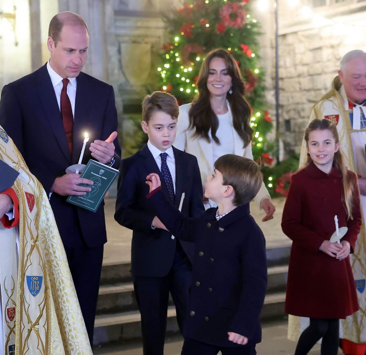 Prince William, Kate Middleton, Prince Louis, Prince George, and Princess Charlotte leave the 'Together At Christmas' Carol Service at Westminster Abbey