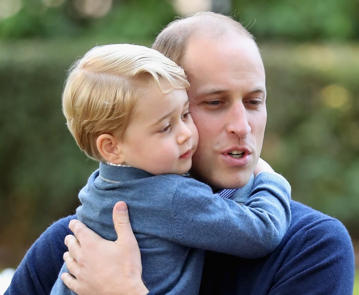 Prince George hugs Prince William