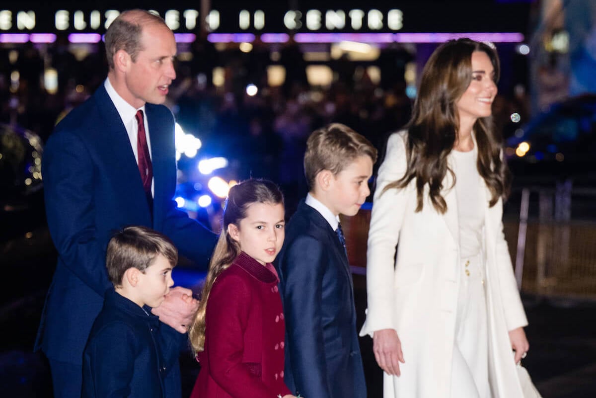 Prince William and Kate Middleton, who are reportedly 'embarrassed' by their 2023 Wales family Christmas card, walk with their children enter Westminster Abbey