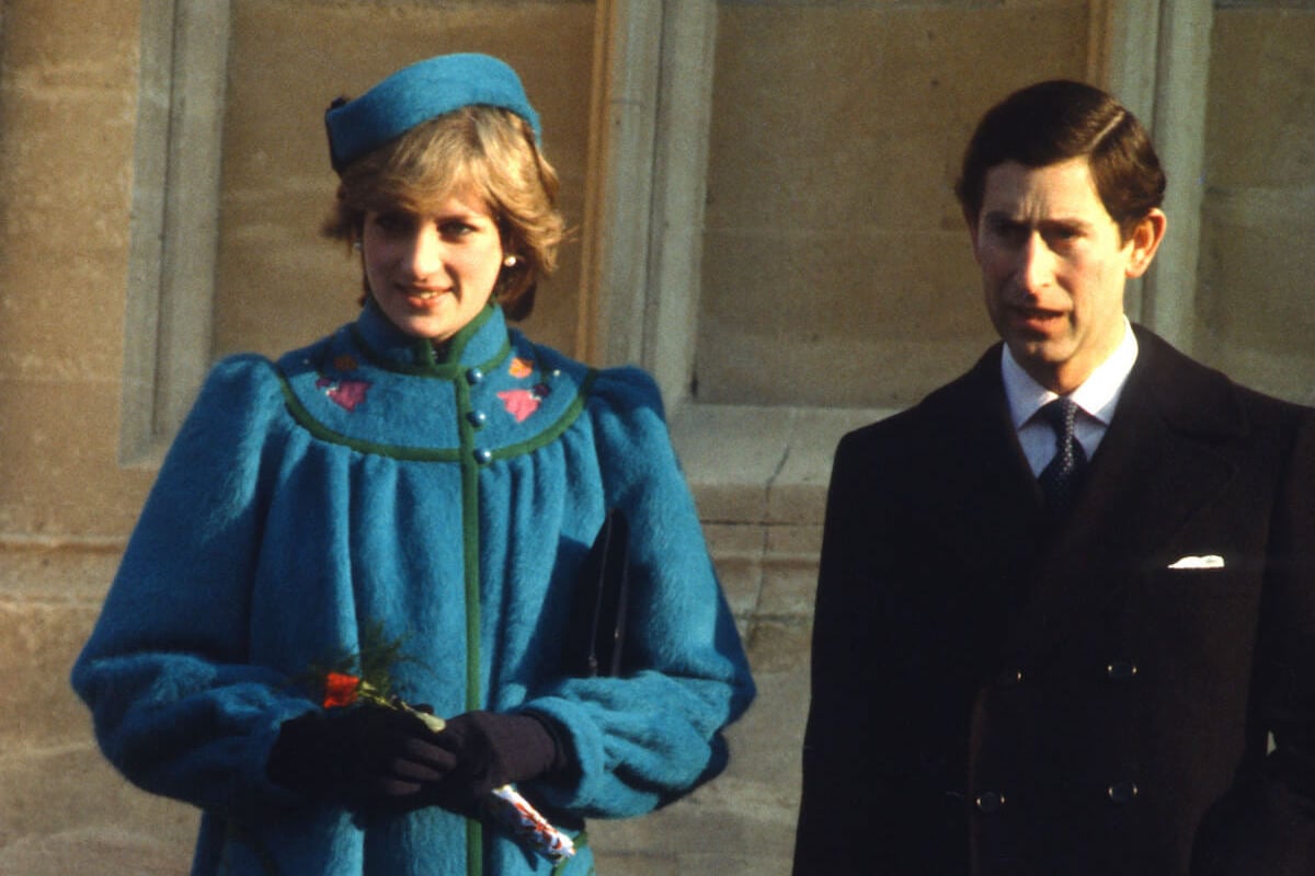 Princess Diana and King Charles stand next to each other on Christmas Day, 1981, their first Christmas together as husband and wife