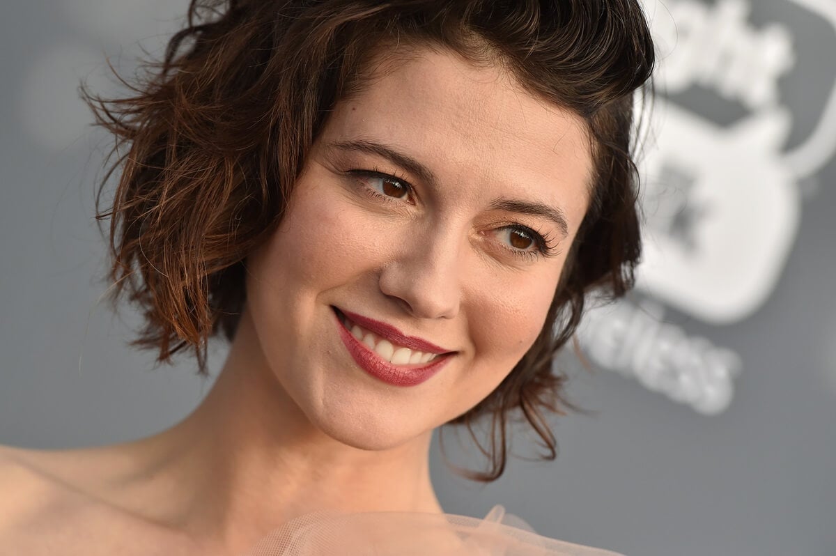 Mary Elizabeth Winstead smiling at the the 23rd Annual Critics' Choice Awards at Barker Hangar in a dress.
