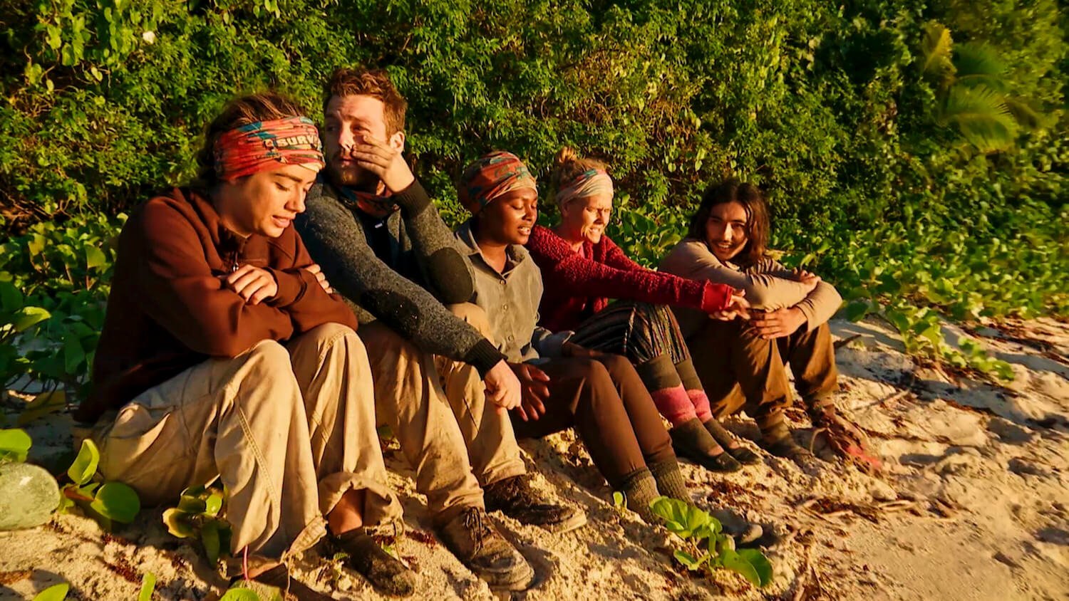 The five finalists sitting on the beach in 'Survivor' Season 45