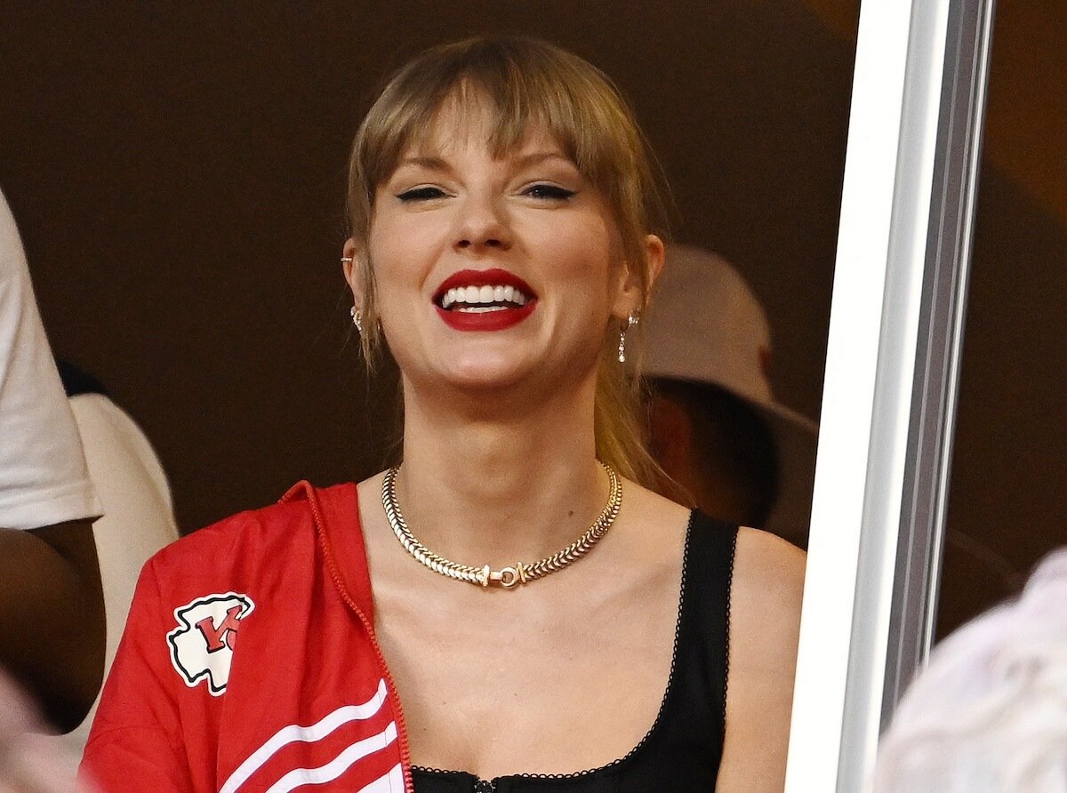 Smiling Taylor Swift at a Kansas City Chiefs game