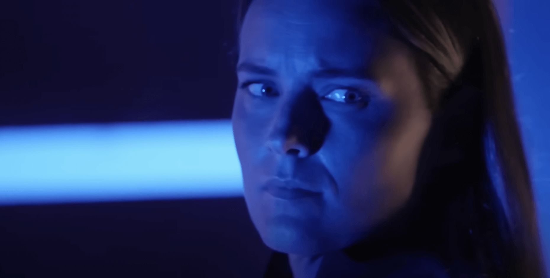 Laurel Stucky looking serious in blue light in 'The Challenge' Season 39 Episode 11