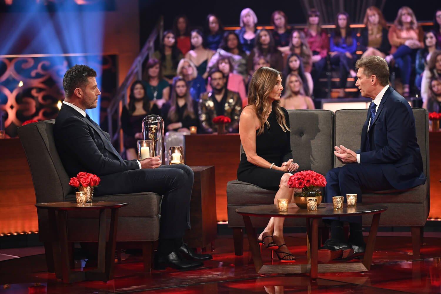 'The Golden Bachelor' stars Leslie Fhima and Gerry Turner sitting across from each other at the After the Final Rose special