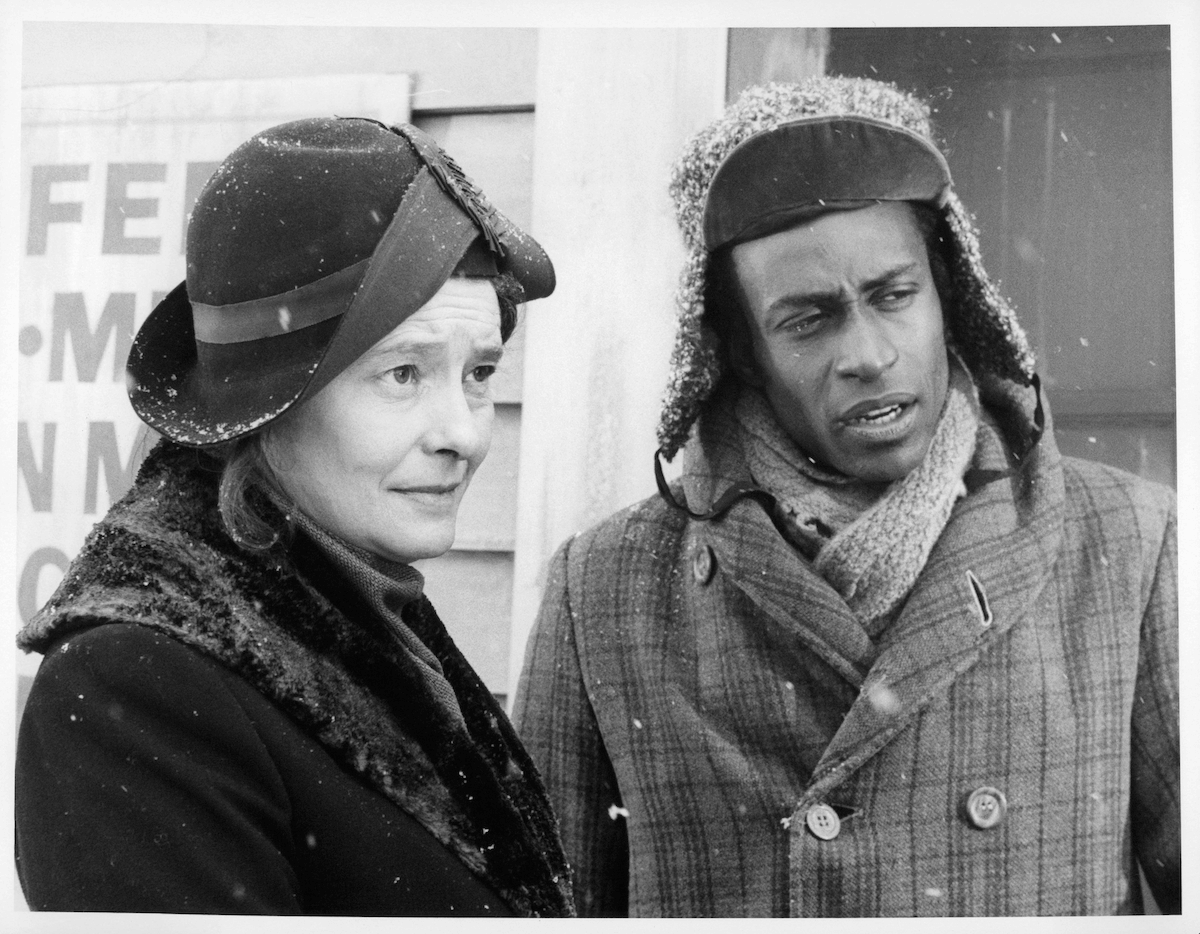 Black and white photo of Patricia Neal and Cleavon Little, wearing winter coats, in 'The Homecoming: A Christmas Story'