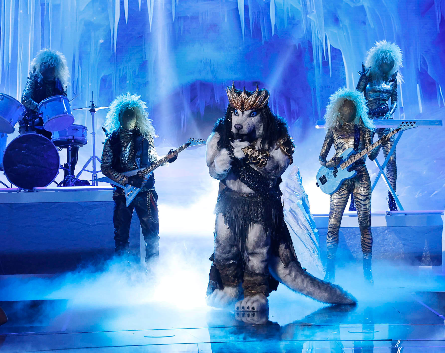 Husky singing on stage in 'The Masked Singer' Season 10 I Wanna Rock Night