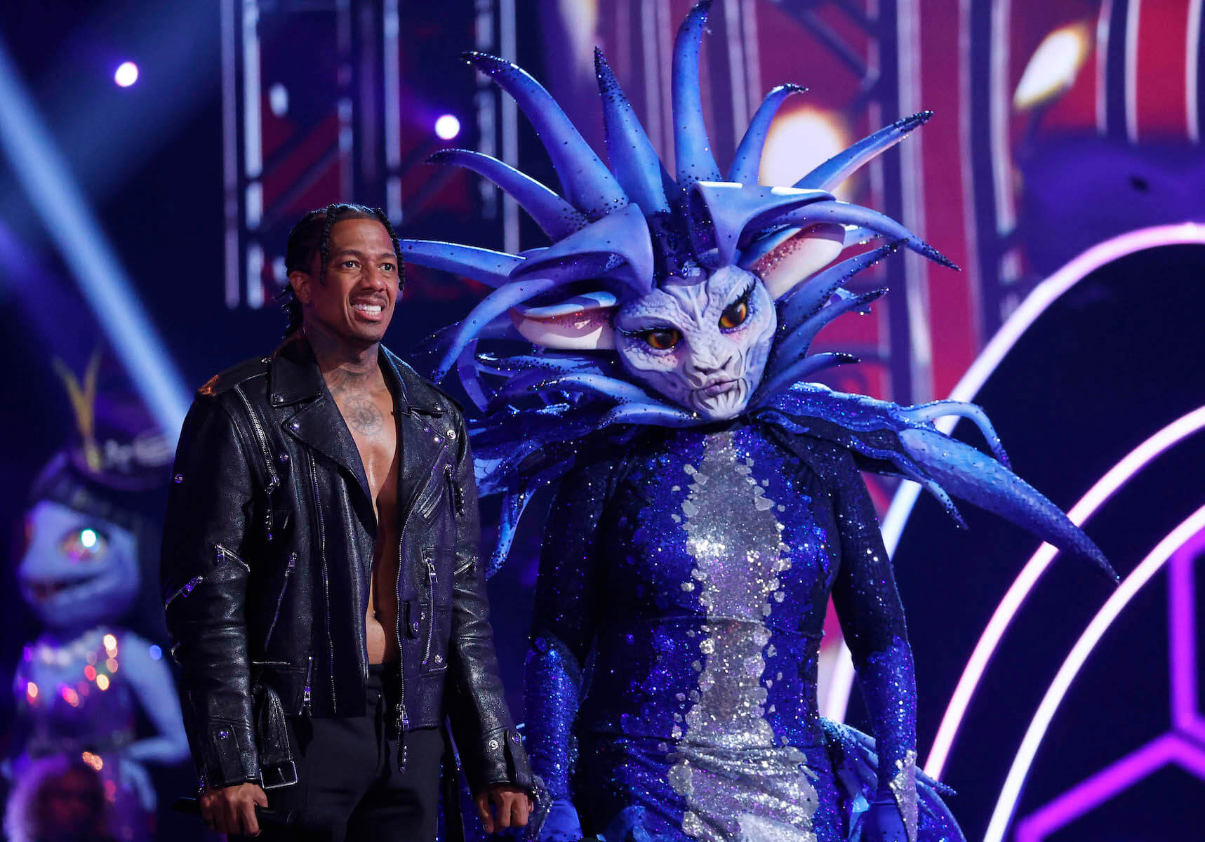 'The Masked Singer' Season 10 singer Sea Queen standing next to host Nick Cannon