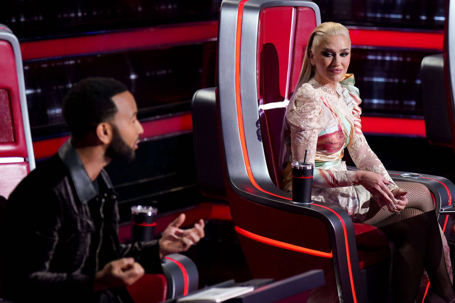 'The Voice' Season 24 coach John Legend sitting next to Gwen Stefani on the show