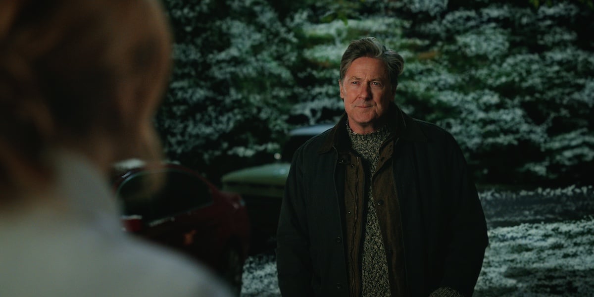 John Allen Nelson as Everett Reid standing in front of Mel in 'Virgin River' Season 5